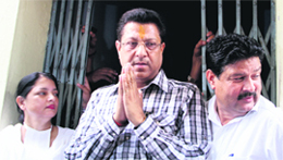 Suryakant Dhasmana, vice-president of the state unit of the Congress, who has been acquitted in the 1994 Karanpur firing incident, comes out of the CBI court in Dehradun on Thursday.