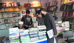 Visitors at the book fair in SP College in Srinagar. 