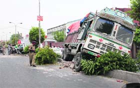 Policemen investigate the accident site near Kitchlu Nagar in Ludhiana on Thursday
