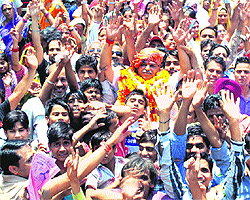 Independent candidate Amar Chand from ward number 34 with his supporters during a roadshow in Patiala on Friday