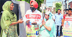 Independent Candidate Ranjit kaur from ward number 44 during door-to-door campaigning in Patiala on Friday