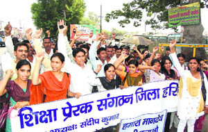 Teachers under the Zila Prerak Siksha Union taking out a march on pay anomalies in Haridwar on Friday. 