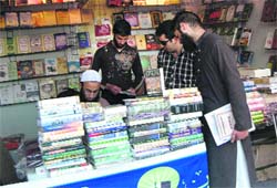 Visitors at the book fair in SP College in Srinagar.
