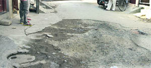 Potholed road in the Abadpura area in Ward 53 of Jalandhar. 