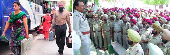 Election officials carry EVMs from a distribution centre; and (right) policemen receive instructions from DCP Satpal Joshi in Amritsar on Saturday.