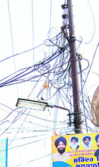 Dangling wires pose a risk in Ward 35 in Amritsar.