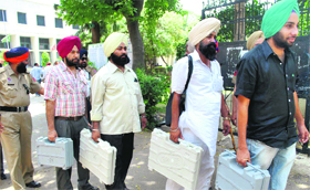 Election officials with EVMs in Patiala