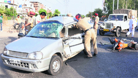 A car that hit a motorcycle at Phase VII in Mohali on Saturday.