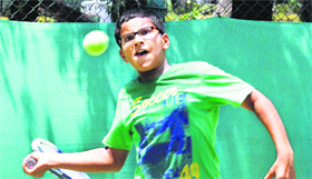 A player takes position for a forehand during a match on Saturday.