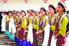 Tibetan artistes wait for the Dalai Lamas arrival during the fourth All India-Tibet Support Groups Conference at McLeodganj on Saturday