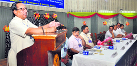 YV Sharma, president of the Jammu Chamber of Commerce and Industry, addresses a seminar in Jammu on Saturday.
