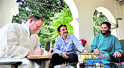 Prof Afroz Taj (right) and John Caldwell (extreme left) from University of North Carolina, USA, share a light moment with DIG MF Farooqui in Ludhiana
