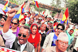 Supporters of the pro-monarchist Rastriya Prajatantra Party shout slogans during a rally in Kathmandu. 