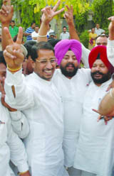 Cabinet minister Anil Joshi along with supporters celebrates SAD-BJPs triumph in MC polls in Amritsar on Sunday. 