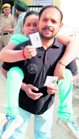 A differently-abled girl on her way to cast her vote in the MC polls