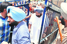 Punjab Congress chief Capt Amarinder Singh visits a polling station at Sewak Jatha School in Patiala after an alleged clash between workers of the SAD-BJP alliance and the Congress on Sunday
