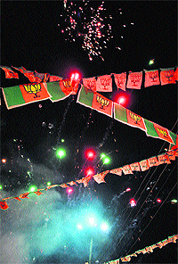 Supporters of SAD-BJP burst crackers to celebrate victory.