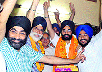 Amarinder Bajaj, candidate from Ward No 45, with his family after the results were declared