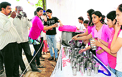 Members of Tamana distribute sweetened water on the occasion of Nirjala Ekadshi at the ISBT in Sector 43, Chandigarh, on Sunday