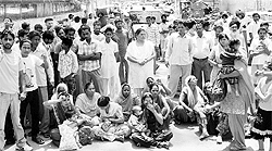 The family and relatives of Naresh Kumar block the link road to the 'tehsil' office at Dera Bassi on Sunday