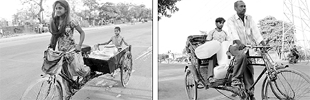 Fourteen-year-old Kajal and her nine-year-old sister, residents of Colony No. 4, return home after fetching water from a tubewell at the Industrial Area in Chandigarh on Sunday