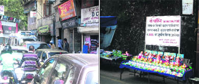 With the tourist season at its peak, people get stuck in a traffic jam at Library Point in Mussoorie on Sunday; (right) street vendors have started business at vantage points on Mall Road, causing inconvenience to commuters.