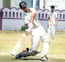 A batsman in action during a match in the Triangular Series Cricket Tournament in Dehradun on Sunday. 