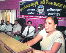 A speaker during a meeting of the Kumaon-Garhwal Scheduled Caste Teachers Welfare Association in Dehradun on Sunday. 