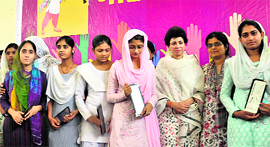 Union minister Kumari Selja with participants at the Mewati Women's Conclave, Nuh (Mewat) on Saturday.