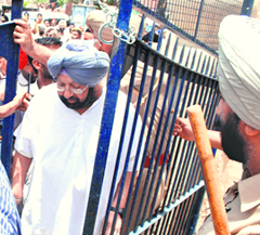 A worried Capt Amarinder Singh visits a polling station in Patiala.