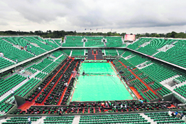 The court is covered after the postponement of the mens singles final between Novak Djokovic and Rafael Nadal due to rain in Paris on Sunday.