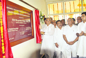 Chief Minister Bhupinder Singh Hooda inaugurates a teaching block at Murthal university in Sonepat.