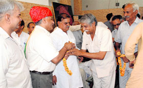 Former Army Chief, General VK Singh, is felicitated on a visit to his native village, Bopara (Bhiwani), on Sunday.