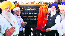 The SGPC chief, Avtar Singh Makkar, inaugurates an RO plant at Shri Guru Ram Das Langar Hall at the Golden Temple complex