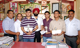 Students of the Harbhajans Institute of Competition, Bathinda, being honoured for cracking the AIEEE.