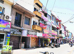 Shops on the outer side of Burail village in Sector 45, Chandigarh. 