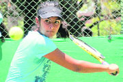 Gulmehar Kaur plays a shot against Nimrat Walia during the CLTA-AITA Tournament in Chandigarh on Tuesday.