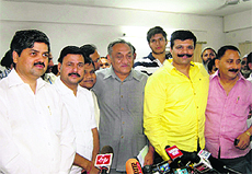 Chief Minister Vijay Bahuguna along with legislators at a press conference in Dehradun on Tuesday. 