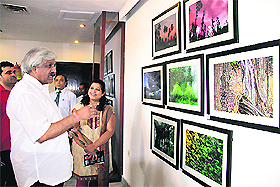 Uttarakhand Sports and Planning Minister Dinesh Agarwal inaugurates photo exhibition of Bhawana Jaiswal in Dehradun on Tuesday.