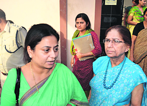 A team of the National Commission for Women (NCW) comes out of a shelter home in Bhiwani on Tuesday.
