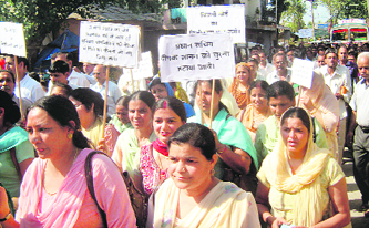 Employees of the HPSEB hold a rally in support of their demands in Kangra on Tuesday.