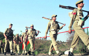 GRP personnel participate in a road march in Jammu on Tuesday.