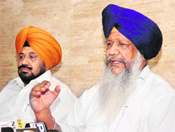 Animal Husbandry and Dairy Development Minister Gulzar Singh Ranike along with Dairy Welfare Director Inderjit Singh addresses mediapersons in Chandigarh on Tuesday.