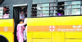 Putting lives in danger, students of Guru Ram Das Institute of Medical Science and Research board an overcrowded institute bus in Amritsar