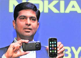 Vipul Mehrotra, Director and Head of Smart Devices, Nokia India, displays the newly launched Nokia 808 Pureview smartphone in New Delhi on Wednesday