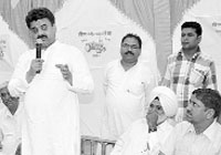 Haryana Janhit Congress leader Chander Mohan addresses Congress leaders of Barwala block at his residence in Panchkula on Wednesday. 