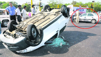 An overturned car at the Sectors 28-27 lightpoint in Chandigarh on Wednesday.