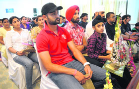 Hockey players during a ceremoney at Haryana Niwas as a part of a conference on Youth in Mass Media in Chandigarh on Wednesday.