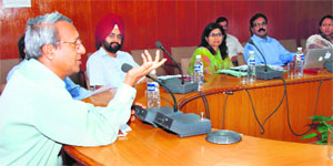 Uttarakhand Chief Secretary Alok Kumar Jain chairing a meeting to review Public Private Partnership (PPP) projects in the state in Dehradun on Wednesday.