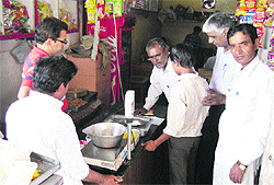A team of the Labour Department rescues a child from a shop in Fatehabad